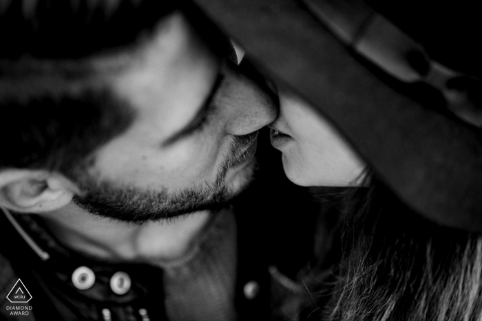 Engagement Session with an Intimate kiss under her hat Calabria (Italy) Engagement Session - Intimate image of a kiss under her hat