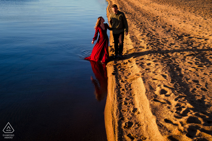 4H Club South Lake Tahoe engagement pictures of Ying and Yang love | walking on the sand and water