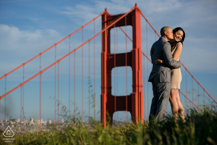 Photo by: <a href="https://www.wpja.com/photos/diamond-award-top-wedding-engagement-photographer/2580040">Tyler Vu - San Jose California San Francisco, California engagement picture - Golden Gate Bride Over Looking SF