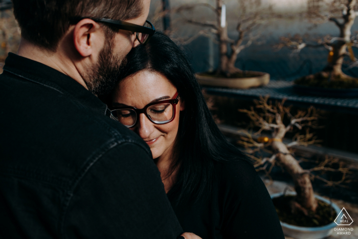 Pescia Engagement Picture | Couple hugging and embracing dressed in black