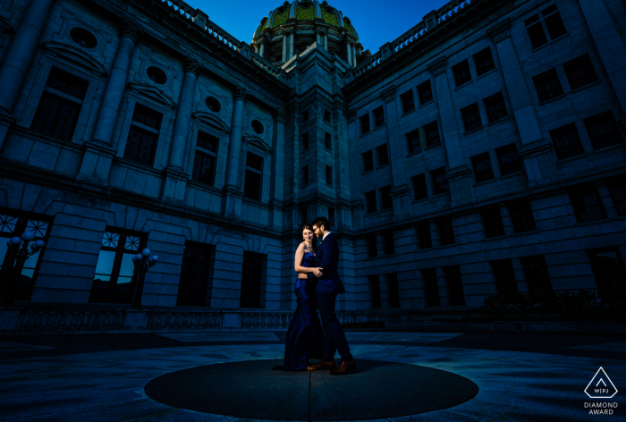 Harrisburg Engagement Portrait | Photographer: "It was a very overcast day and this area was on the backside of the building in total shade. I used a 1/4 CTO gel to help push the overall scene even more blue while correcting for the couple's skin tones"