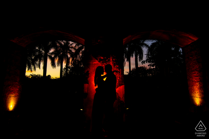 Dorado, PR engagement photographer: Orange gel to pop the Silhouette of couple. 