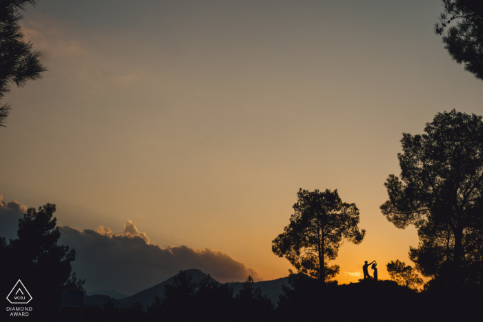 engagement shoot at sunset in the park trees at dusk Engaged Couples Photographer | Cyprus engagement shoot at sunset