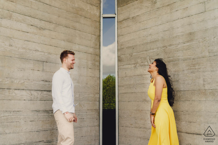 Creative urban engagement shoot with concrete and a yellow dress Engagement Photo Session at Southbank London - Creative engagement shoot in London