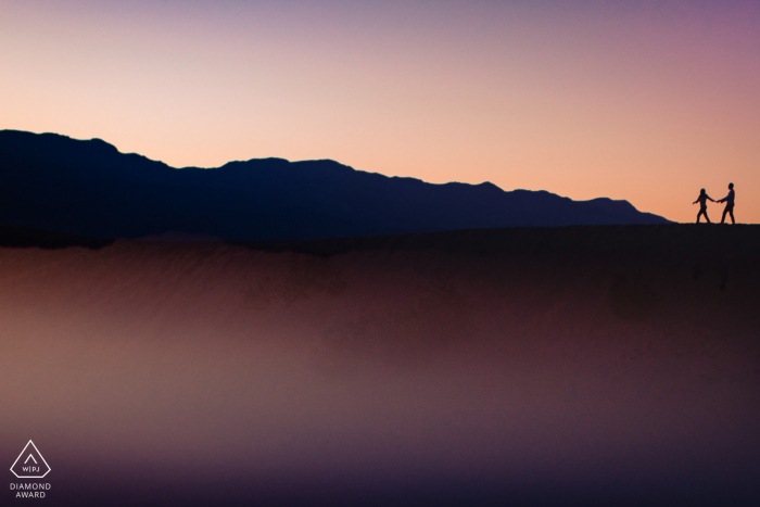 Engagement Sessions | Mesquite flat sand dunes - Silhouette in sand dunes 