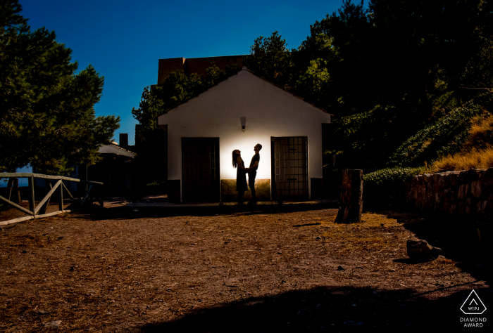 Aguilas - Spain lit engagement portrait In the shadows