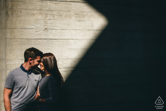 a pre-wedding shoot with urban concrete and shadows London pre-wedding shoot