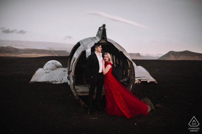 Iceland Engagement Photography | Red Dress and Plane Crash