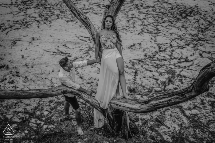 Linhares, Espírito Santo, Brazil engagement photo session in a tree with a young couple in black and white