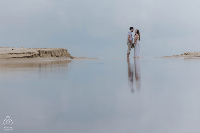 Water is the best mirror for couple portraits Phu Quoc Island engagement photographer: Water is the best mirror for couple portraits
