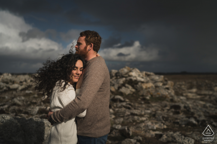 engagement couple portrait on the france beach rocks engagement couple portrait on the rocks of Crozon, France