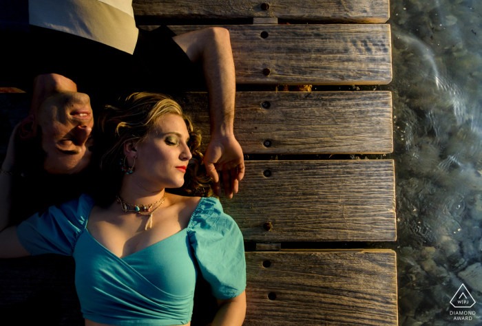 an engaged couple Under the illumination of the summer sun of Aguilas - Spain	