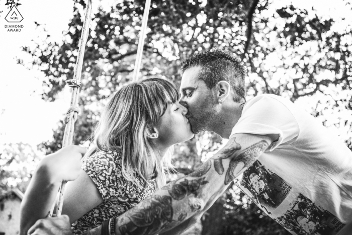 a swinging embrace for this engaged couple during a Predappio, Forlì-Cesena, Italy engagement photoshoot