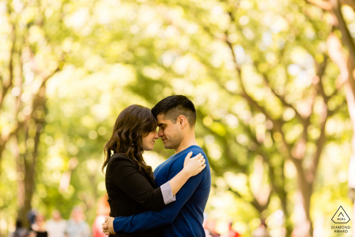 Central Park, New York City engagement photo of a couple putting heads together Central Park, New York City engagement photographer - Let's put our heads together!