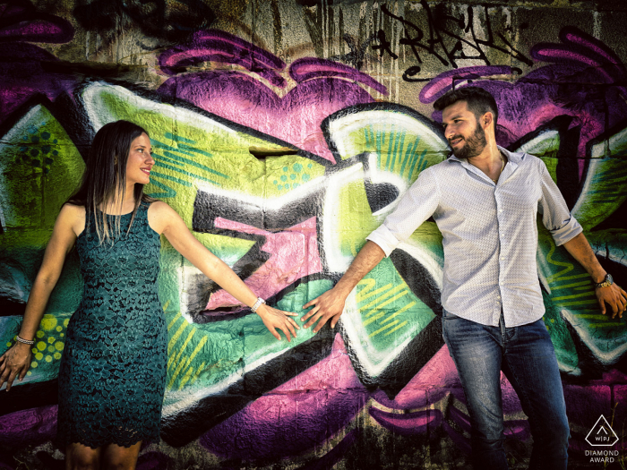 Ceparana Love engagement on the streets with graffiti wall art