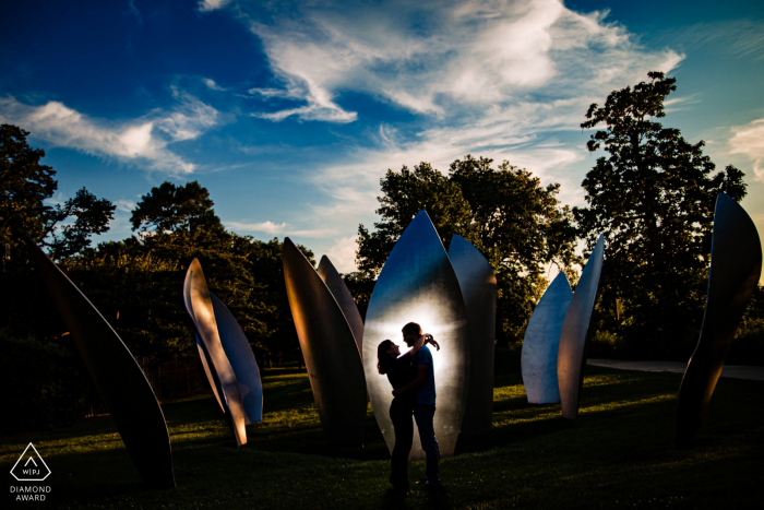 jackson park, chicago engagement portraits with a couple in front of a sculpture