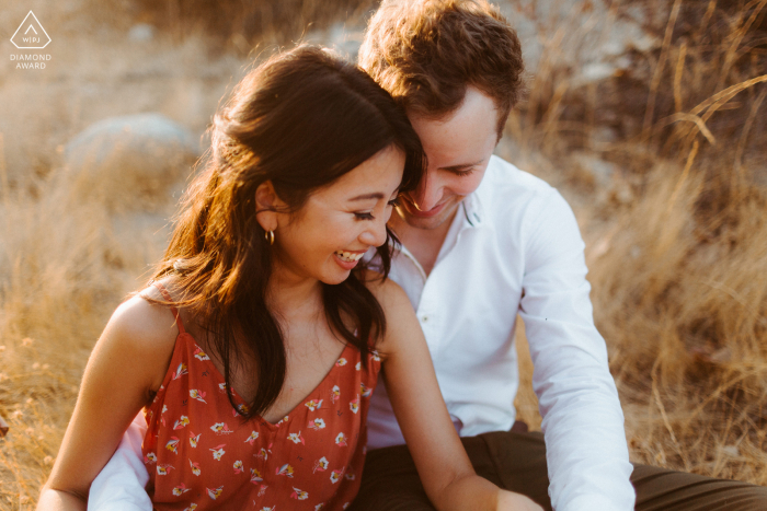 Los Angeles, California Sunset snuggling in LA during a warm engagement photo shoot