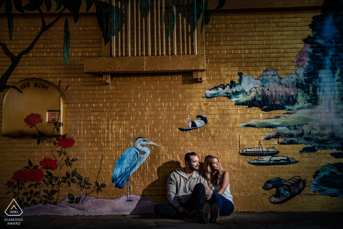 Chicago Illinois ping tom park engagement photo session with a couple and a mural wall