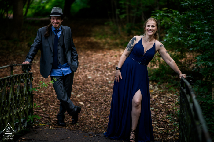 Flanders engagement photoshoot in the trees of Beveren with a retro couple