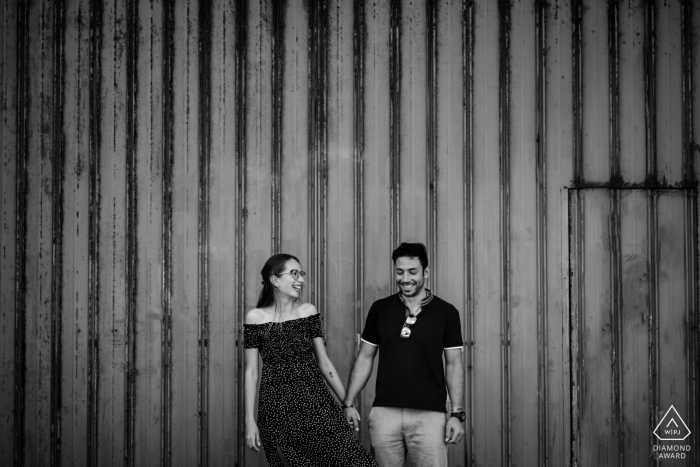 Australia engagement photoshoot & pre-wedding session from an urban scene in Perth with the couple Laughing together