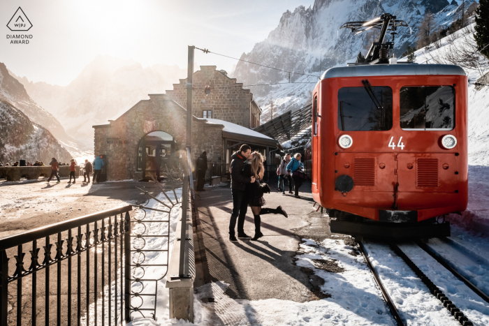 French Alps, France mini urban pic shoot before the wedding day with a couple next to a train