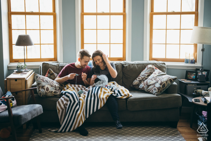 Chicago engagement photo session with the Couple Knitting in their home before the wedding day