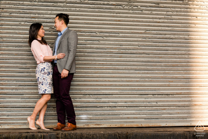 Meat Packing District couple portrait, stopping for a quick kiss