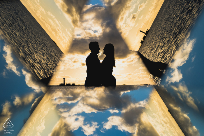 Maceio engaged couple picture session couple in front of the sea with some artistic prism reflections