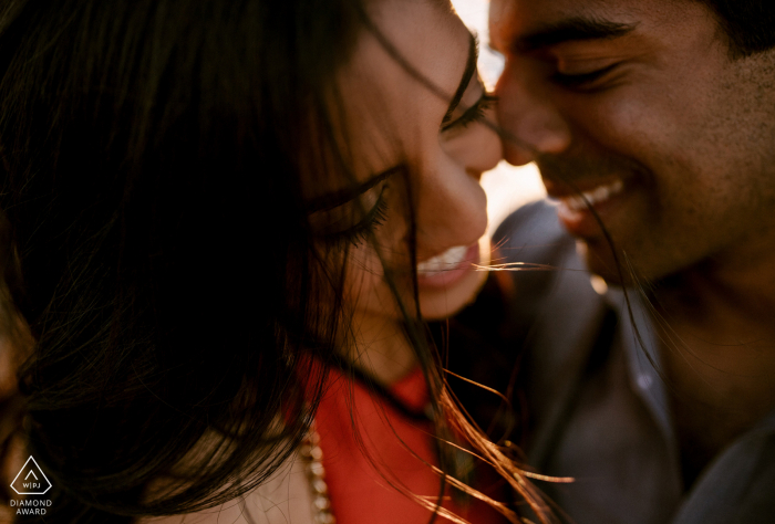 Santa Monica Pier Fine Art Engagement Image in the beach sunlight with a light wind