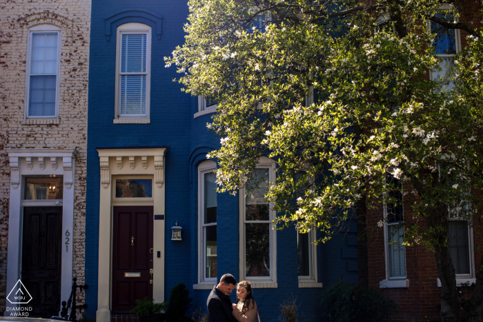 Capitol Hill Fine Art Pre Wedding Portrait in DC while The couple is looking at the bride's ring 