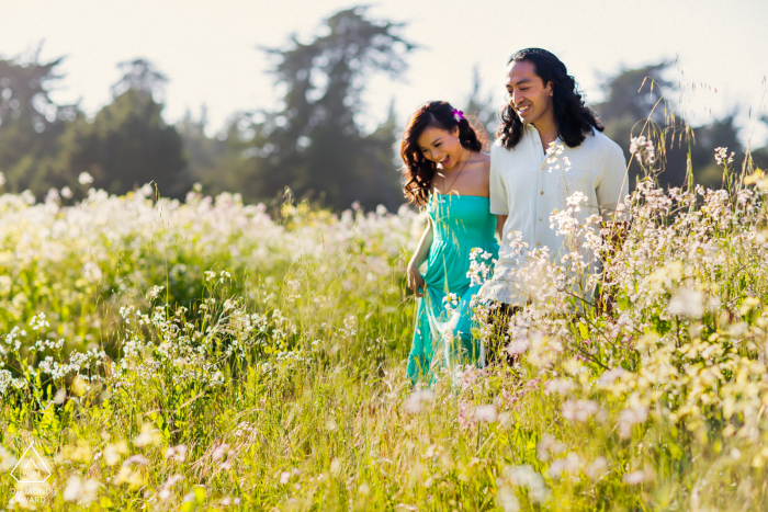 Santa Cruz Artful Engagement Photography showing Lovers walking through a flower field on a warm, lovely day in Spring Santa Cruz Artful Engagement Photography showing Lovers walking through a flower field on a warm, lovely day in Spring