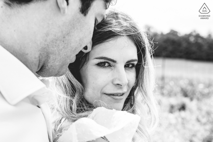 Orvieto on-location portrait e-shoot of a closeup of the bride-to-be hugged by her fiancee