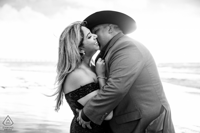 Port Aransas Beach portrait e-session during the Sunrise in TX with his cowboy hat