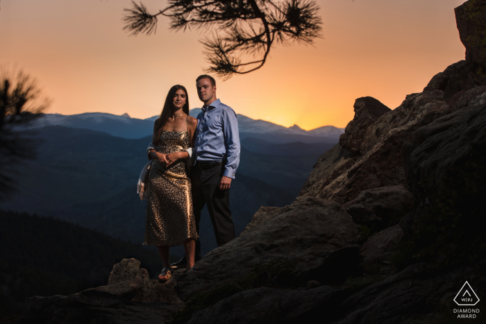 True Love Pre-Wedding Portrait Session at Boulder's Lost Gulch Overlook capturing a couple striking a dramatic pose in the Rocky Mountains at sunset