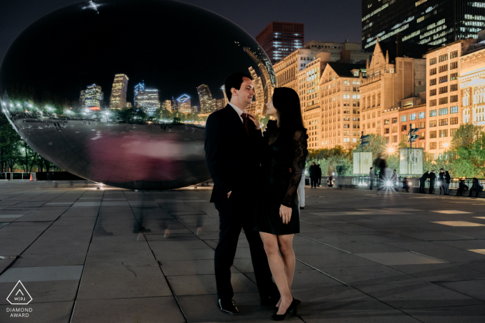 Chicago couple e-shoot in IL at night in the USA urban city scene Chicago couple e-shoot in IL at night in the USA urban city scene