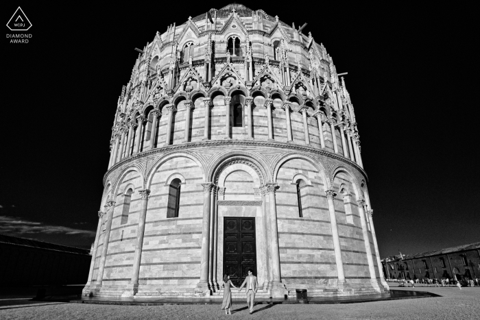 Pisa bride and groom to be, posturing for an engagement image at the Piazza dei Miracoli - Square of Miracles