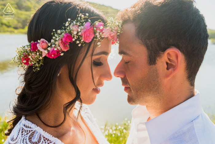 Praia do Francês bride and groom to be, posing for a pre-wedding engagement photo shoot standing face to face closely Praia do Francês bride and groom to be, posing for a pre-wedding engagement photo shoot standing face to face closely