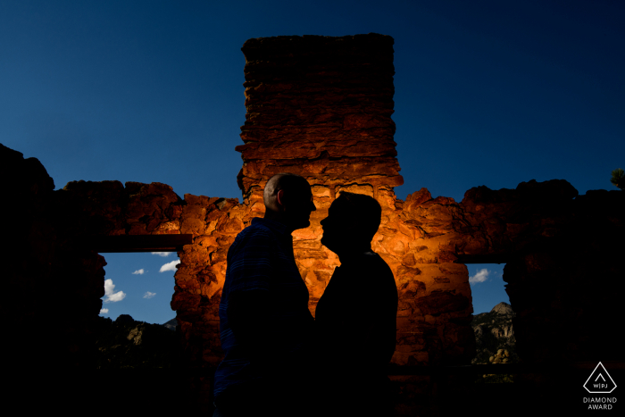 Outdoor Estes Park, Colorado engagement photography portraits showing the couple enjoys an afternoon together in nature