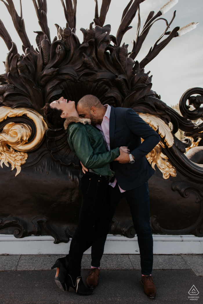 Paris environmental couple pre wedding image session with a kiss and a dip