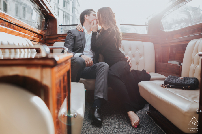 Pre-wedding couple portrait-session with a Passionate couple on an holiday in Venice, kissing on a water taxi ride