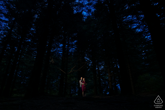 Pisgah National Forest couple pre-wed portrait of a couple that was enjoying themselves in a hemlock thicket during twilight