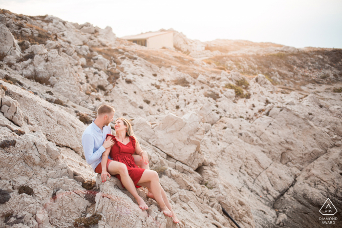 Marseille post proposal portrait photos of a happy France couple created as the bride to be laughs at the groom