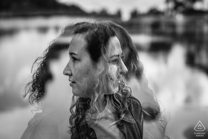 Lagoa de Sintra post proposal portraits from a bw Portugal engagement session using a Double exposure technic of the couple looking to each other 