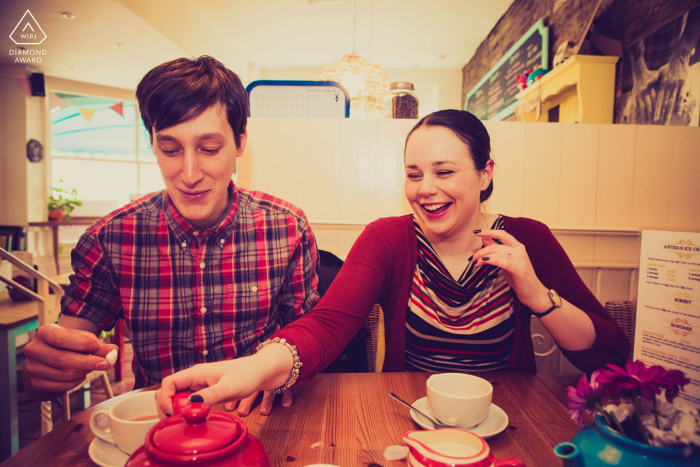 An after the wedding proposal engagement picture session at Whitby in North Yorkshire when it was  minus 16C with the windchill factor so the couple stopped for tea in a little tea shop