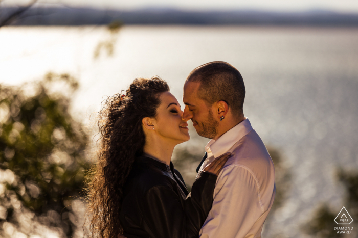 She said yes, post marriage proposal picture session in Umbria, Lake Trasimeno for the couple on the shore of the lake