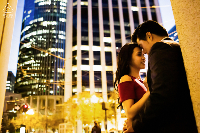 San Francisco nontraditional lifestyle engagement portrait of a couple enjoying some Romance in the city at night 