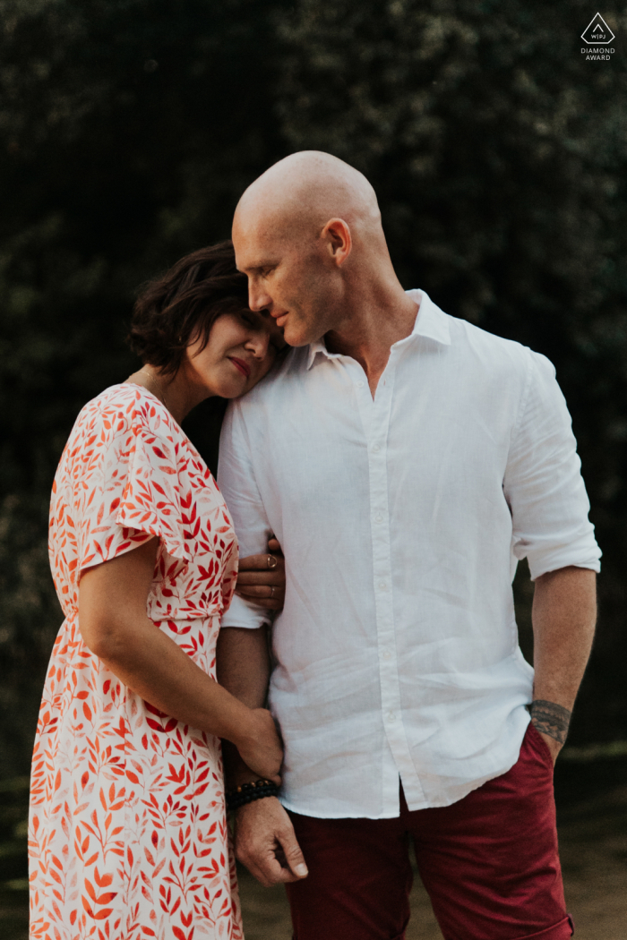 Sancerre	engagement portrait photoshoot for embracing lovers outdoors in the soft afternoon light