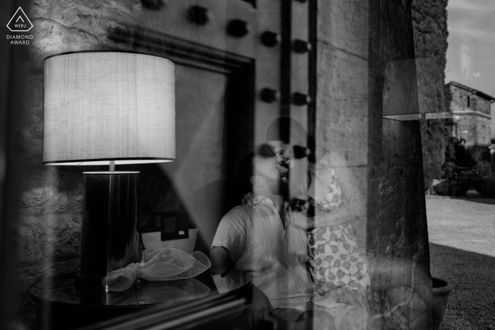 BW couple portrait from Borgo Scopeto, Siena, Italy showing reflections and transparencies around a great love