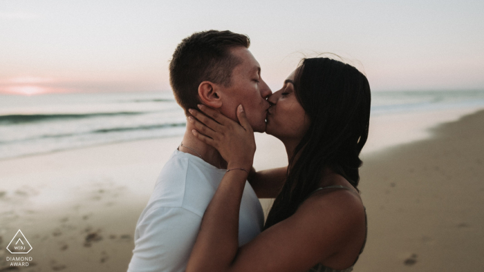Close up kiss at the beach during a pre-wed portrait shoot at Le Porge Océan