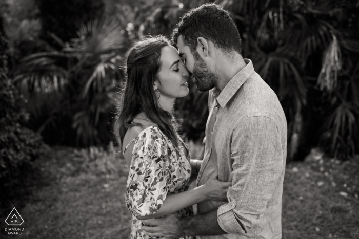 a couple is kissing in this black and white portrait A couple from France is kissing in this BW portrait from Castera-Lectourois